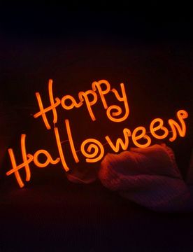 Happy Halloween Neon Dekoschild 60 cm x 30 cm orange