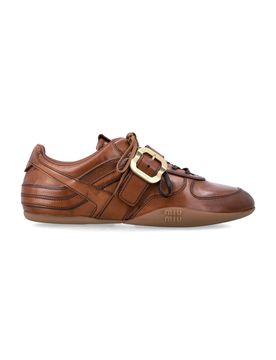 Refined Aged Leather Women's Sneakers with Statement Strap
