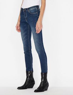 Jeans skinny blu mirato in cotone stretch con schiariture lungo le gambe