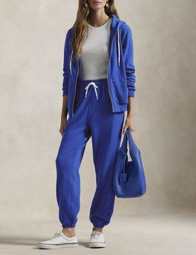 Pantaloni blu royal in felpa di cotone garzato con elastico al fondo e logo rosso ricamato