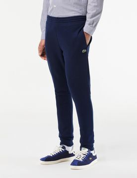 Pantaloni blu in felpa di cotone con logo coccodrillo verde sul fianco
