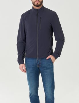 Giubbino blu in leggero tessuto tecnico elasticizzato impermeabile