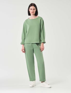 Pantaloni verde chiaro in felpa di cotone garzato dalla linea dritta con elastico in vita