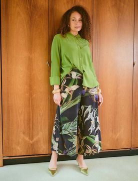 Pantaloni palazzo neri in crêpe di viscosa e cupro a fantasia orchidee