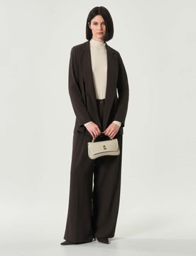 Pantaloni marroni oversize con pinces in vita