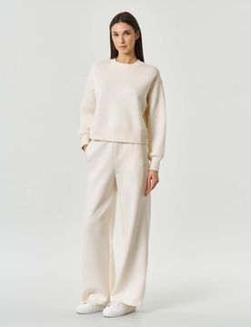 Pantaloni jogger Exchange avorio in misto cotone con logo ricamato