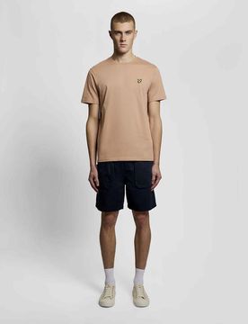 T-shirt mezza manica cipria in cotone con logo aquila gialla ricamata sul petto