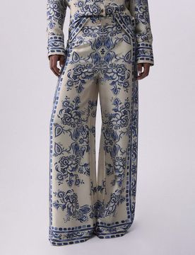 Pantaloni Liu Jo a palazzo beige con stampa maiolica azzurra e chiusura a zip e bottone