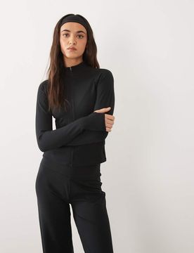 Icon - Top zippé doux de yoga à manches longues - Noir 42