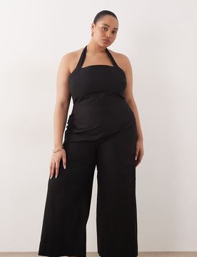 ASOS DESIGN Curve - Neckholder-Jumpsuit in Schwarz Schwarz 50