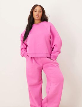 ASOS DESIGN Curve - Pantalon de jogging ample à envers brossé - Rose 2XL