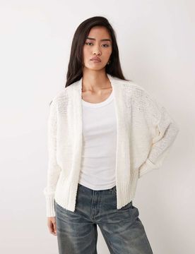 Strickjacke in Cremeweiß mit offenem Design und Noppenstruktur Weiß L