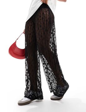 Weit geschnittene Hose aus Spitze in Schwarz Schwarz XS