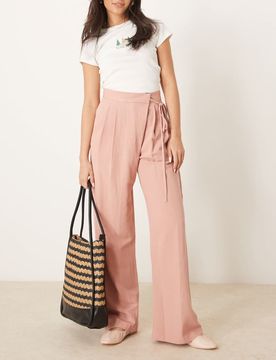 Weit geschnittene Leinenhose in Apricot mit Bindedetail vorne-Rosa Rosa 32