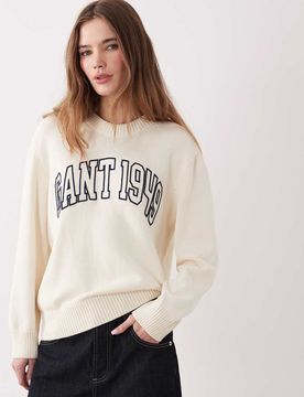 Strickpullover aus Lammwolle in Cremeweiß mit Zopfmuster und Logo auf der Brust Weiß XS