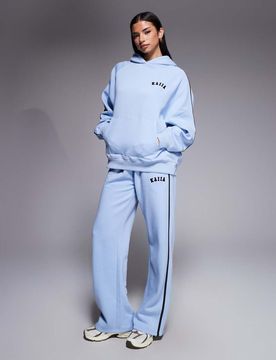 Pantalon de jogging ample d'ensemble en coton majoritaire à logo brodé et bande contrastante - Bleu pastel 42