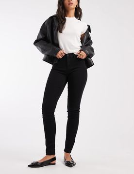 Rain - Eng geschnittene Jeans mit mittelhohem Bund in Schwarz Schwarz M L32