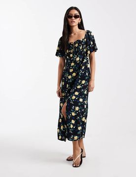 Amara - Midikleid in Schwarz mit Flatterärmeln und Blumenmuster Schwarz XS