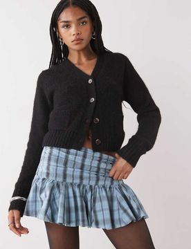 Cropped-Strickjacke in Schwarz mit Fronttaschen Schwarz L