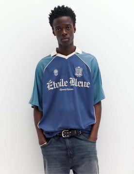 Fußball-Polohemd in kräftigem Blau mit „STWD"-Grafikprint Blau L