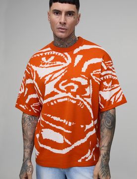 Herren Großes Übergroßes Jacquard-Strick-Oberteil Mit Abstraktem Gesichtsmotiv Orange Größe XL