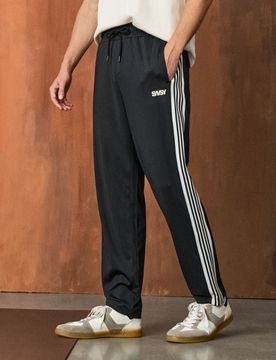 Pantaloni sportivi con banda laterale - nero