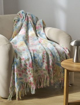 Coperta con motivo floreale e frange - multicolor