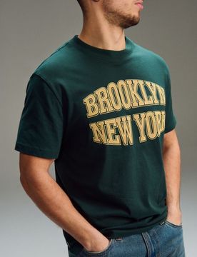 T-shirt in cotone con scritta - verde petrolio