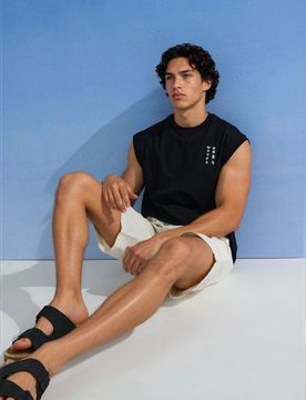 T-shirt in cotone taglio boxy con scritta Waves - nero