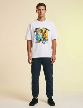 T-shirt in cotone con stampa graffiti - bianco