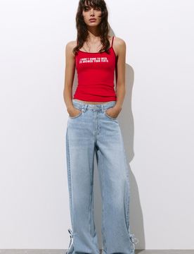 Jeans Gamba Larga Con Lacci