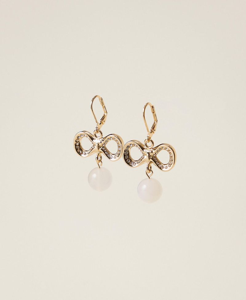 Boucles d'oreilles avec strass et logo