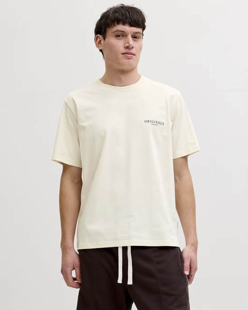 T-shirt mezza manica avorio in cotone con stampa floreale sul retro
