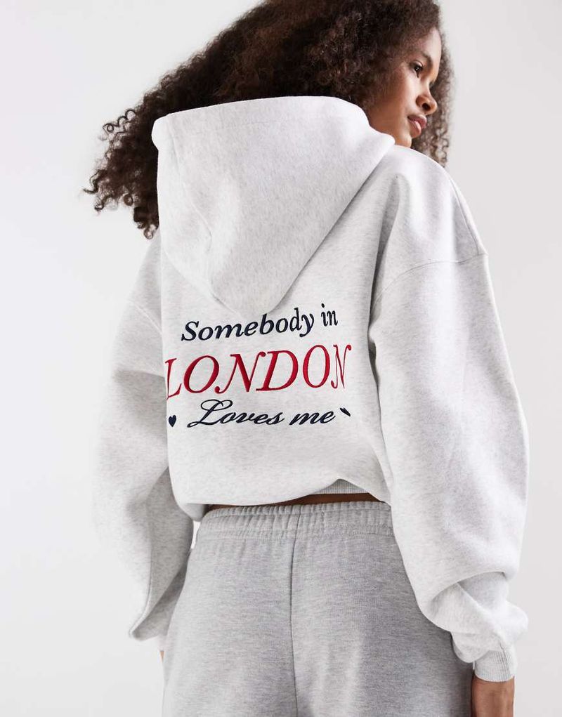 Supre - Ella - Oversize-Kapuzenpullover aus Fleece in meliertem Schneeweiß, Kombiteil-Grau Grau L-XL
