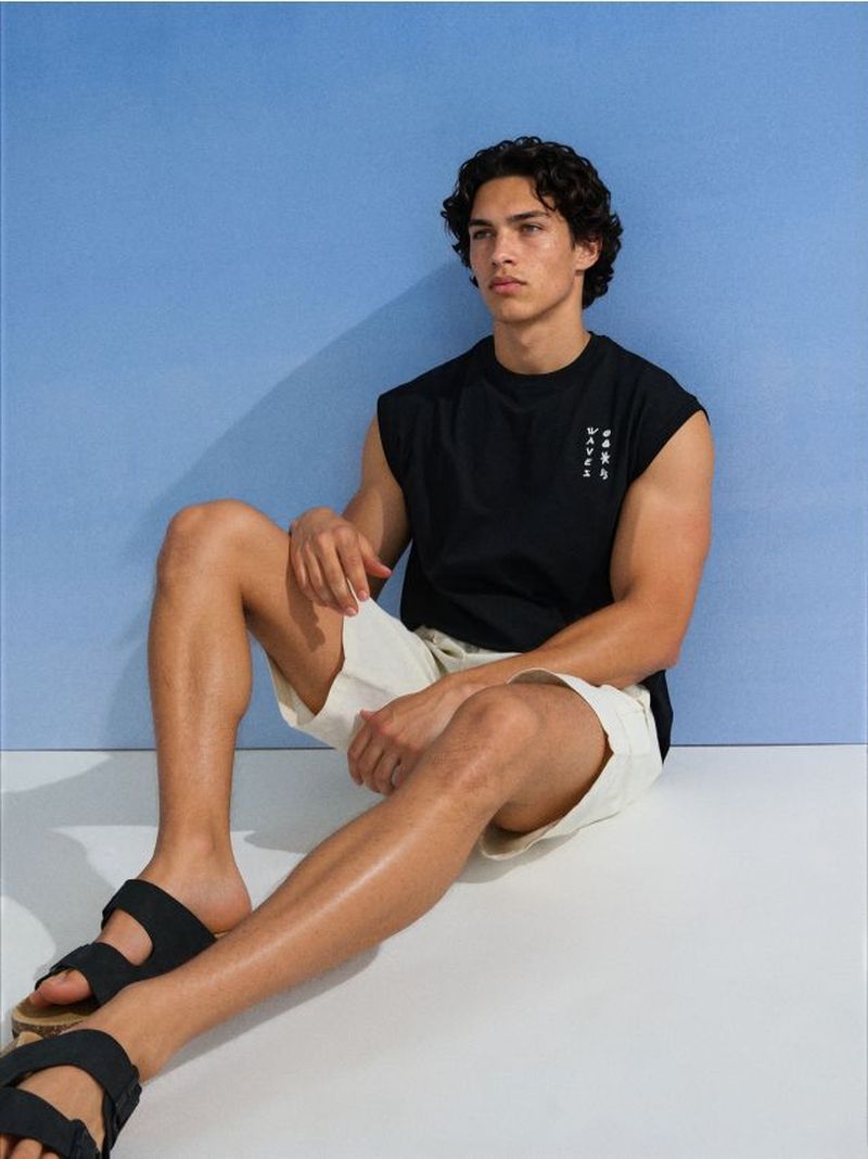T-shirt in cotone taglio boxy con scritta Waves - nero